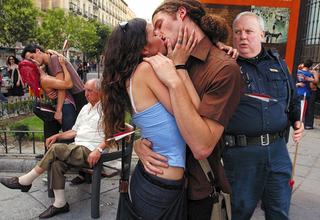 Police question victims who were attacked by Cupid (below).